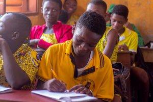 Student studying for the BECE in Kwabenya